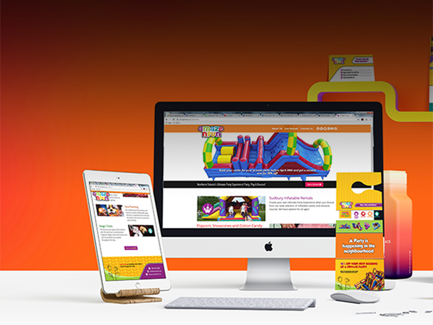 A Maze N Fun website open on a desktop and tablet next to printed promotional material