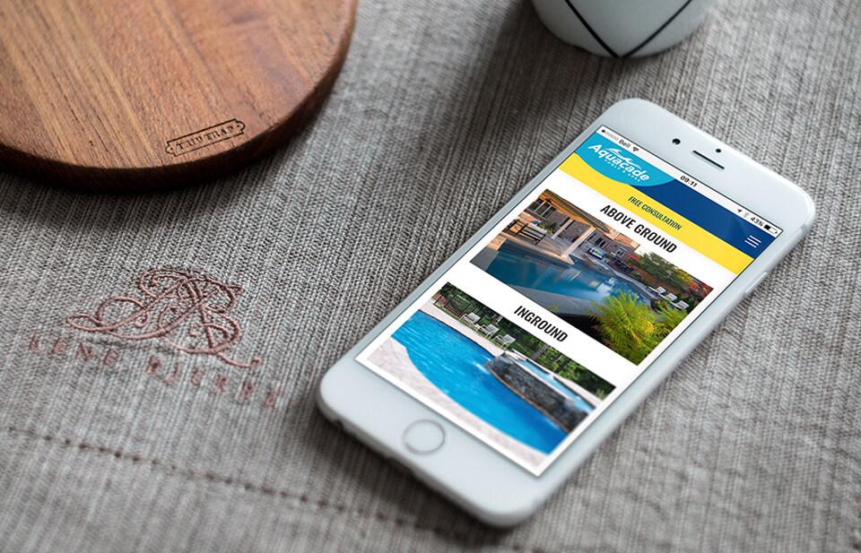 Aquacade responsive site open on a mobile device