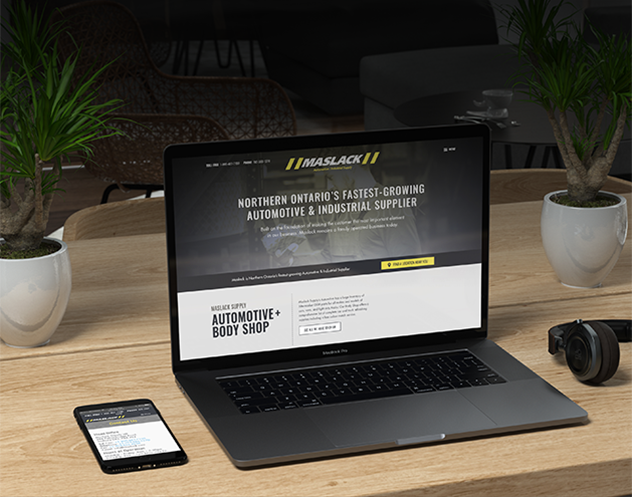 Maslack's Website open on a laptop and cellphone
